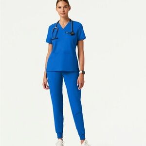 Jaanuu Women’s jogger scrub set in Vibrant Blue xs